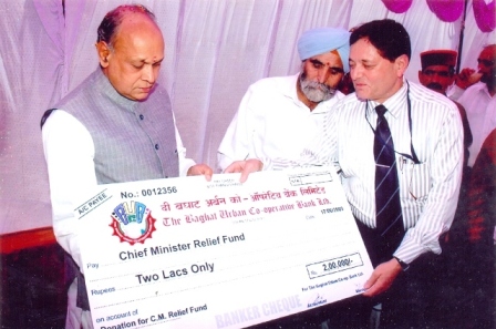 CM Relief Fund donation event photo